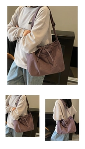 Detail of dark purple canvas tote bag featuring adjustable drawstring and bow tie closure