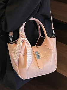 Pink stone pattern bucket bag with decorative scarf and silver twist lock closure