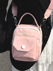 Mini sac à bandoulière rose sport pour femme avec sangle réglable et poche avant