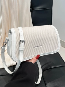 Elegant white crossbody small square bag with textured weave and silver buckle details