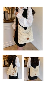 Detailed close-up of woven hollow pattern and brown leather patch on beige tote bag