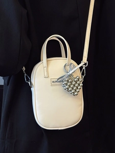 Chic cream white mini crossbody bag for women with stylish silver heart bead charm