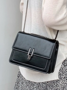 British style black leather crossbody bag with chain strap and silver metal buckle