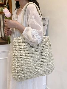 Minimalist straw woven tote bag with large capacity for summer beach or casual commute