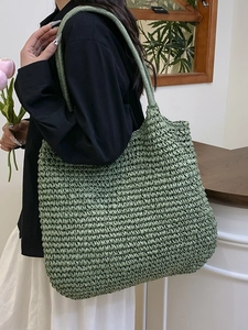 Minimalist grass green woven straw tote bag with large capacity for casual shoulder wear