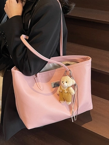 Pink lychee grain leather tote bag with bear charm and silver metal logo plate