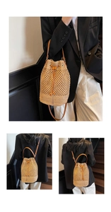 Detail of hollow woven straw bucket bag with drawstring closure and brown leather strap