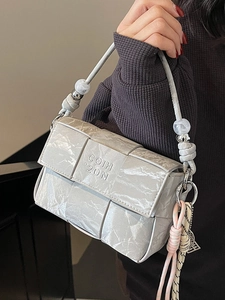 Chic light gray woven leather crossbody bag with beaded strap and unique knot design