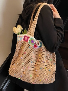 Sunflower crochet tote bag with colorful beads and grandmother square floral patterns