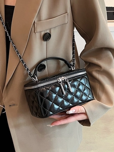Classic black quilted leather vanity box bag with silver chain strap for women