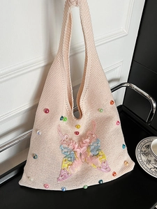 Pink knit shoulder bag with colorful beads and large floral butterfly 3D embroidery