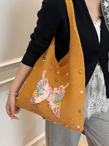 Chic mustard yellow knit shoulder bag with 3D beaded butterfly for beach vacations
