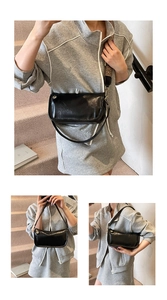 Détails du sac en cuir noir brillant avec bandoulière jacquard et boucles dorées