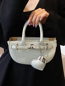 White lychee pattern leather semi-circle handbag with heart charm and silver swivel lock