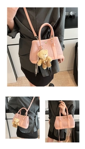 Pink woven texture bucket bag detail with golden button and cute plush bear charm