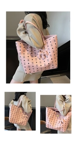Detailed macro view of pink litchi grain tote bag with bear print and cute bear charm