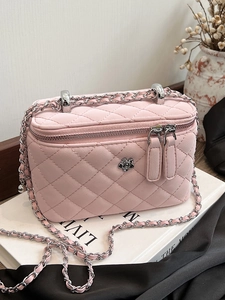 Pink quilted leather vanity box bag with chain strap and silver rose logo detail