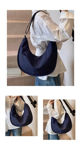 Detailed views of navy nylon crescent bag featuring adjustable strap and silver hardware
