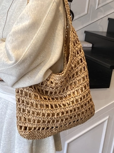 Minimalist straw woven tote bag with hollow out design for summer beach vacation use