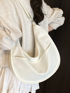 White nylon hobo crescent bag with adjustable wide strap for casual daily use