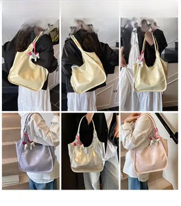 Multiple views of women large capacity patent leather tote bag with horse pendant