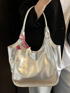 Metallic silver leather tote bag with large capacity and a cute winged horse charm accessory
