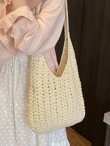 Minimalist beige hollow crochet woven tote bag for beach vacations and casual summer style