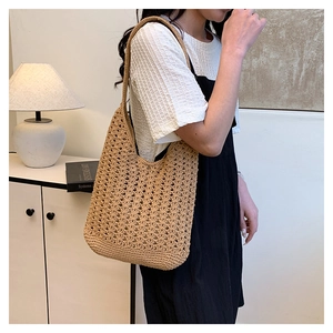 Close-up of lightweight crochet tote bag with intricate woven texture and hollow pattern