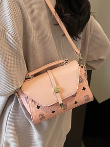 Pink faux leather square handbag with cartoon bear patterns and metal twist lock