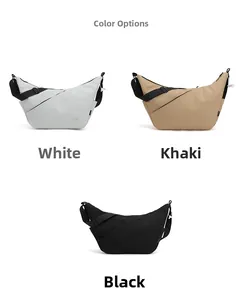Three minimalist crossbody moon bags in white, khaki and black with wide straps