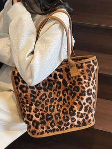 Stylish large leopard print tote bag with brown woven handles for casual fashion wear