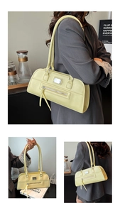 Détails du sac sous le bras jaune avec plaque métallique et fermeture éclair à franges