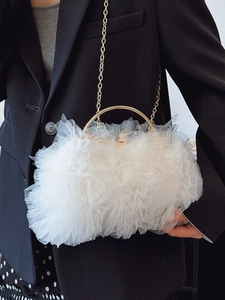 White ruffled tulle clutch bag with golden metal handle and rhinestone sphere clasp