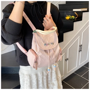 Pink Korean style backpack featuring colorful Mearey embroidery and drawstring closure