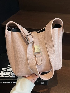 Pink litchi texture leather bucket bag with silver buckle for office and casual style