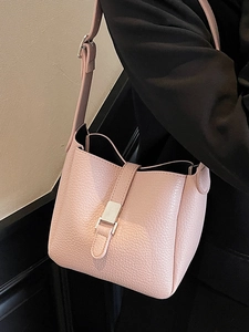 Pink lychee texture leather bucket bag with adjustable shoulder strap for women