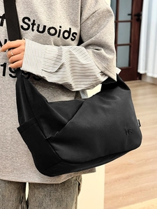 Minimalist black messenger bag with MS embroidery and wide shoulder strap