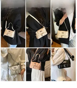 Collage de sacs seaux chic en beige, argent et noir avec détails de boucles à œillets