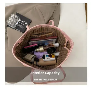 Spacious interior view of the pink leather tote bag showing large capacity for essentials
