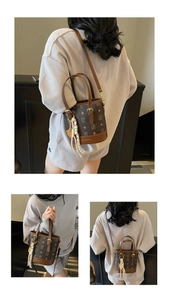 Detailed views of vintage monogram bucket bag with silk scarf and long strap options