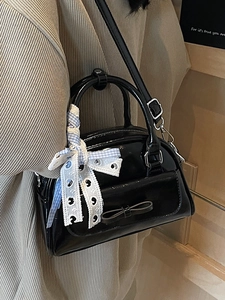 Black patent leather Boston bag with bow and plaid lace ribbon for modern women