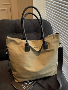 Grand sac fourre-tout en toile vert olive avec poignées en cuir et bandoulière amovible