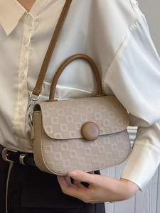 Minimalist beige crossbody handbag with grid texture and brown button closure for women