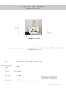 Detail view of large white canvas tote bag with black print showing size and dimensions