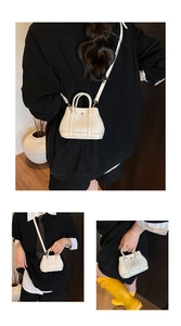 Litchi texture mini white handbag showing crossbody and hand-carry styles on model
