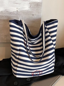 Minimalist blue striped canvas tote bag with red embroidery for daily commuting