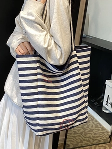 Large blue and white striped canvas tote bag with dog embroidery for casual daily commute