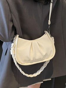 Minimalist cream pleated crescent underarm bag with braided strap for women