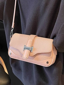 Women's pink leather and woven crossbody bag with silver H buckle and slim strap