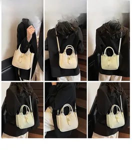 Multiple views showing the cream-white litchi grain bucket bag carried by a model